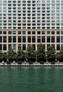 Exterior of the Sheraton Grand Chicago Riverwalk beside the Chicago River.